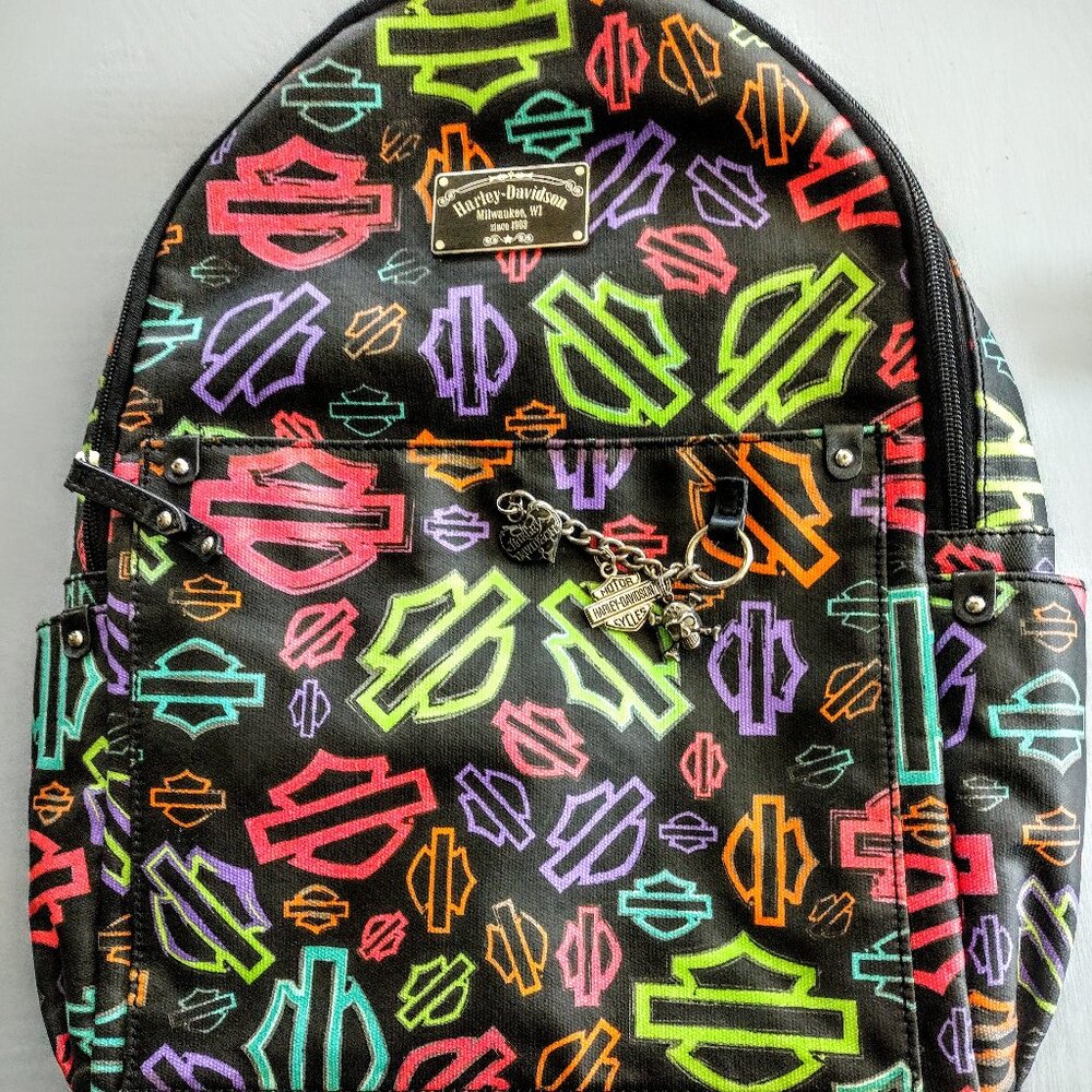 Harley Davidson back pack, orange lining, with charms